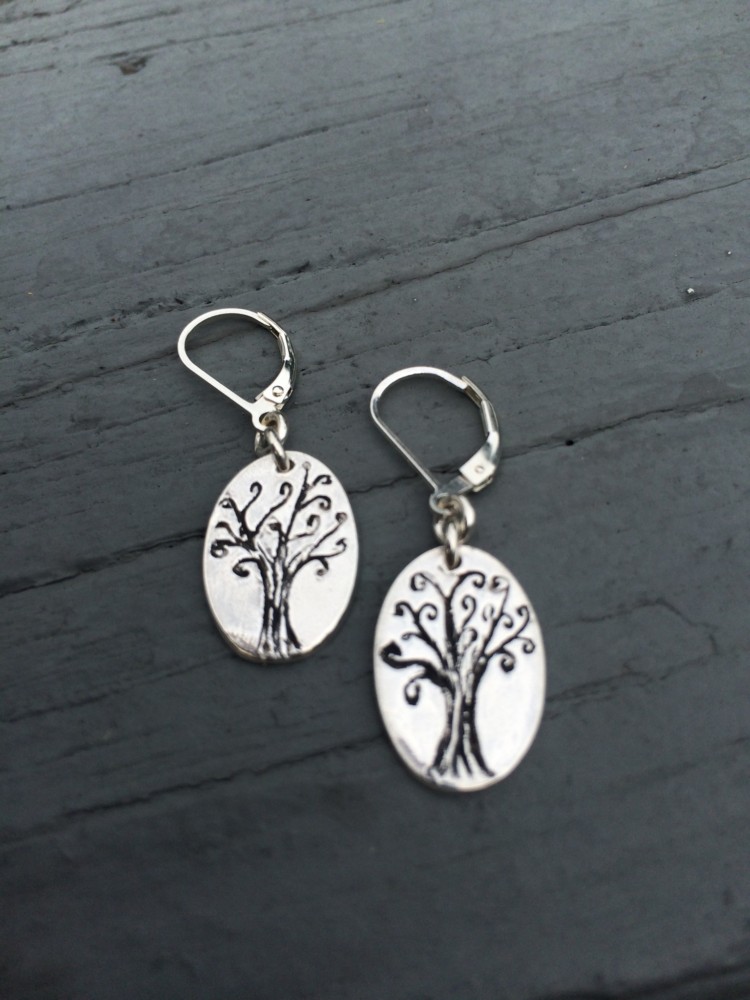 Fine Silver whimsical tree earrings,  hand etched and oxidized. These one of a kind earrings are finished securely on lever back findings. Each pair will be slightly different since each one are made completely by hand.