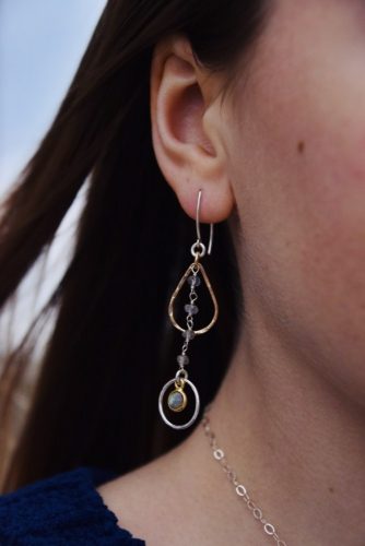 This beautiful earring design is a keeper. Lightweight and lots of movement, these will pick up the sun and hold its rays. Mixed Metal style of silver and gold with apatite beads and a small labradorite stone, dangling from our long v shaped earwire.